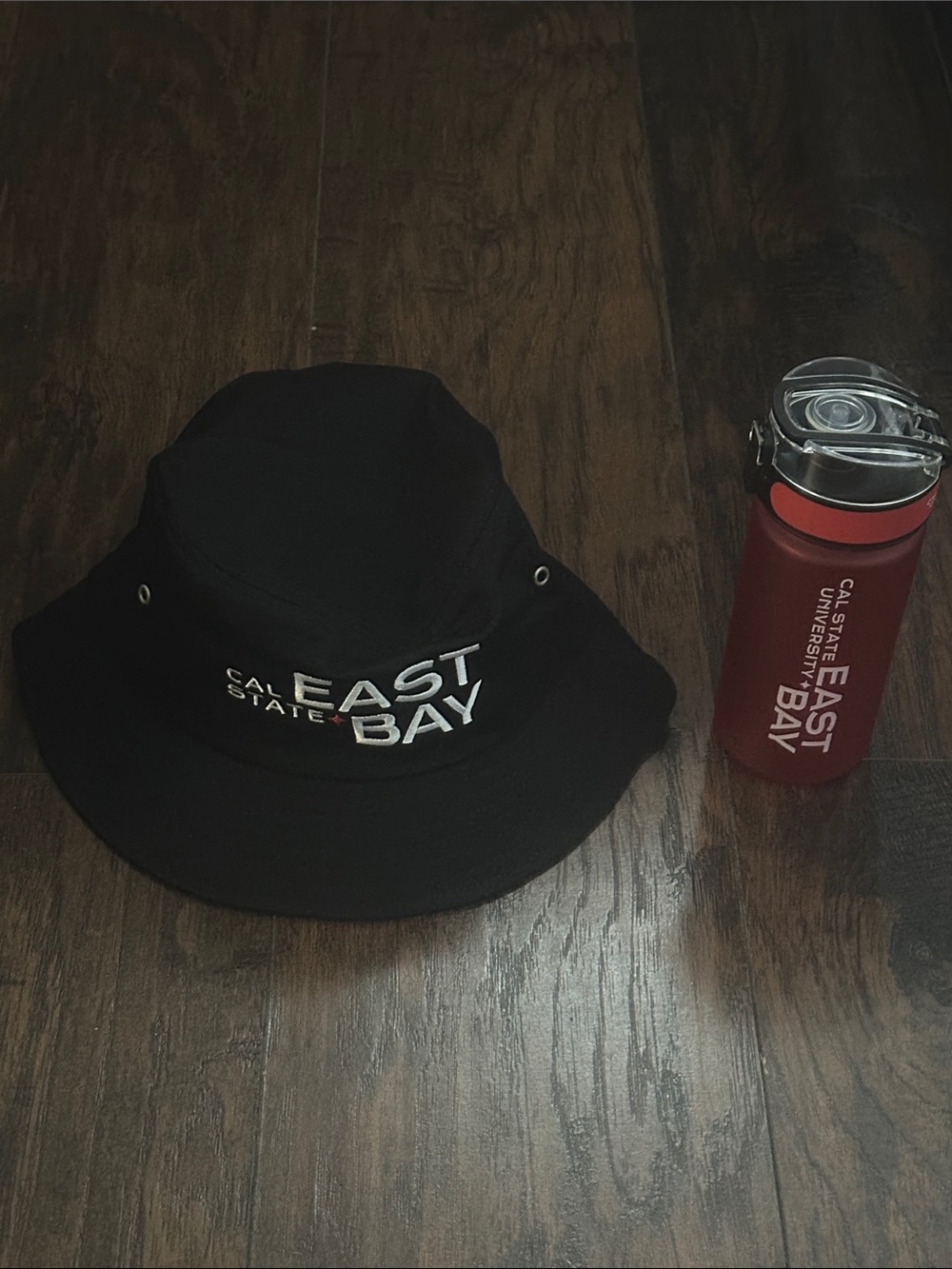 Cal Sate East Bay Black Bucket Hat with Embroidered White Logo & Red waterBottle